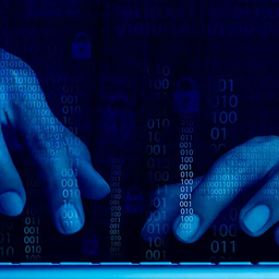 Header-hands-working-with-keyboard-computer-on-dark-blue-tone-background